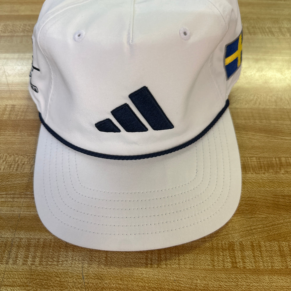 
                      
                        Adidas Tour 5 Panel Hat - White/Navy with Swedish Flag and Peanuts and Golf Logo
                      
                    